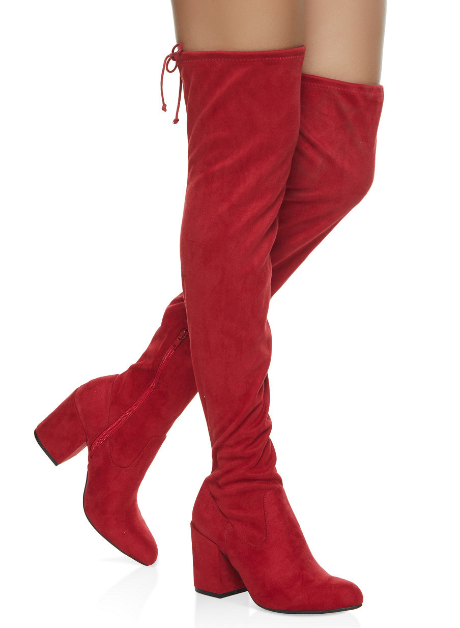knee high red bottom boots